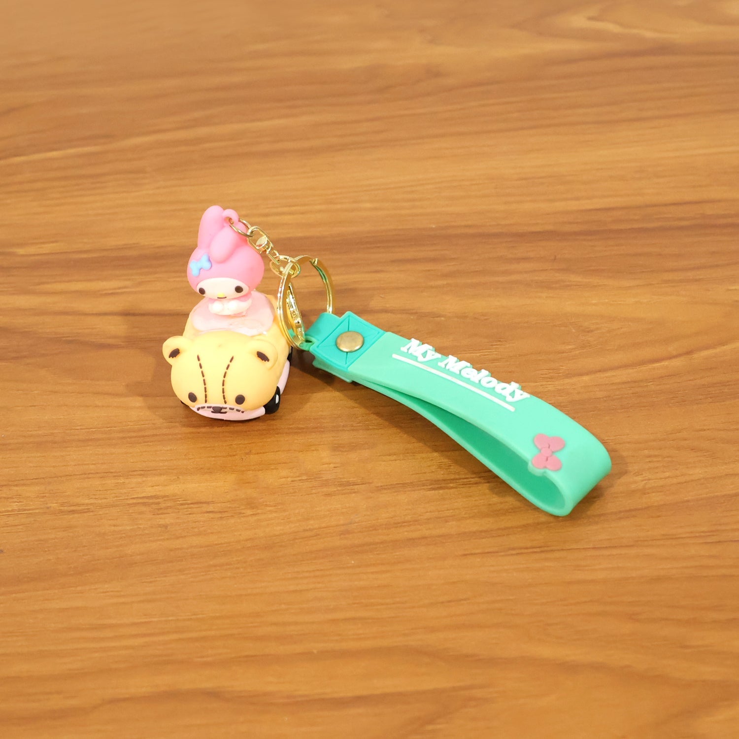 Playful cartoon charm key holder designed for kids and students