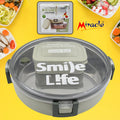 Miracle Stainless Steel Lunch Box with a clear lid and small plastic insert, ready for daily meals.