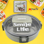 Miracle Stainless Steel Lunch Box with a clear lid and small plastic insert, ready for daily meals.