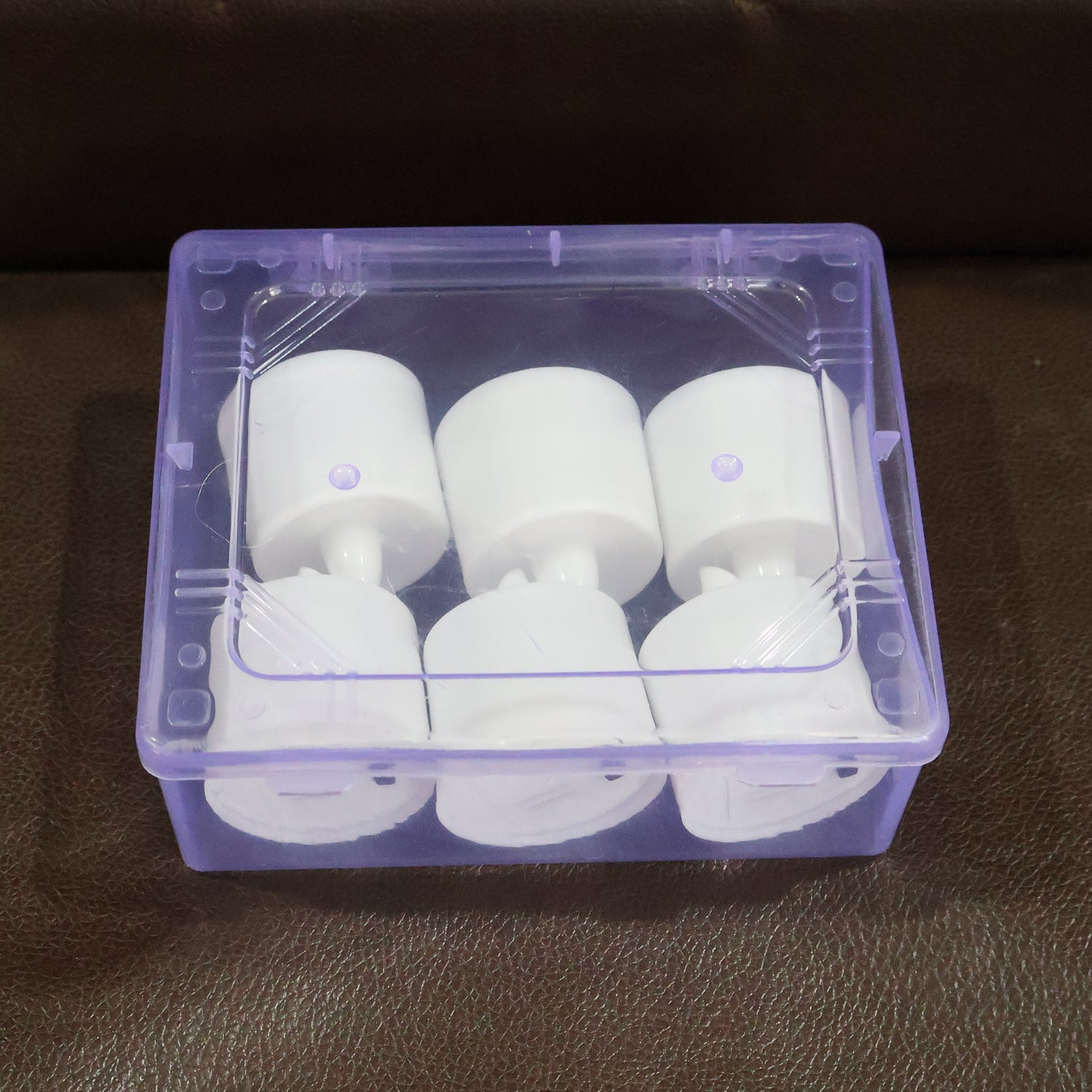 Blue LED Tea Light Candle providing ambient decorative lighting indoors