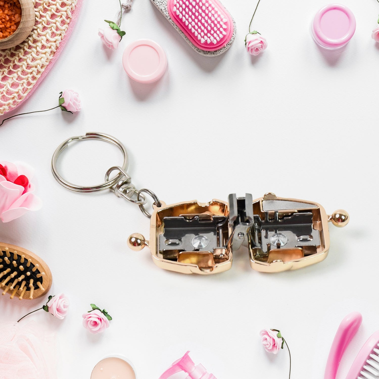 Close-up of nail clipper keychain demonstrating sharp stainless steel blade