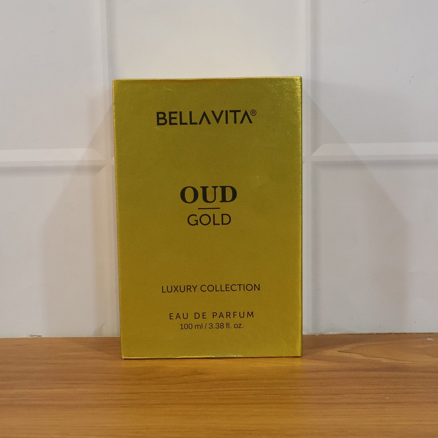 Elegant gold-themed packaging of Bellavita oud perfume