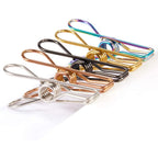 Pile of heavy-duty stainless steel clips, showcasing their robust construction for multipurpose use.