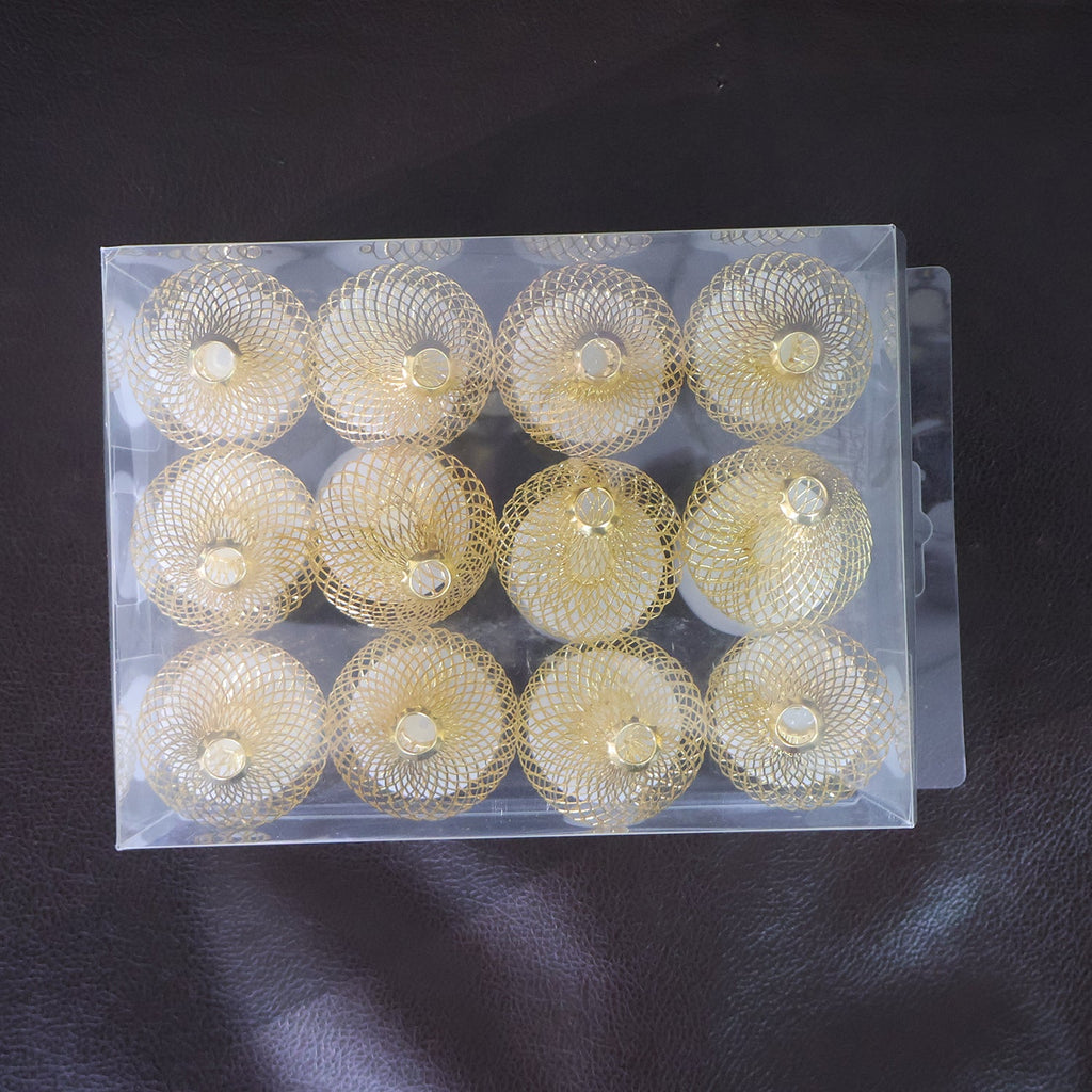 Decorative LED flameless candle lights with golden net cover enhancing festive ambience