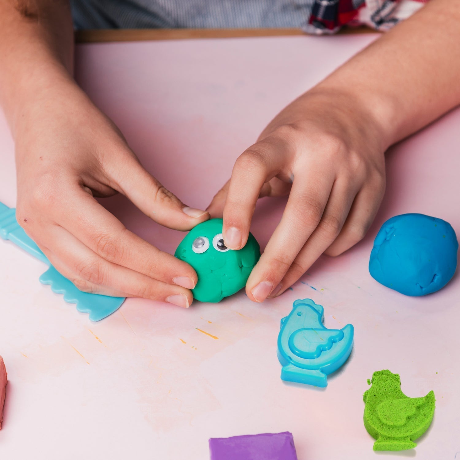 Complete Kinetic Sand Kit with colorful sand and multiple play tools for endless fun.