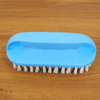 Heavy-duty scrub brush tool designed for deep cleaning stubborn dirt and stains.