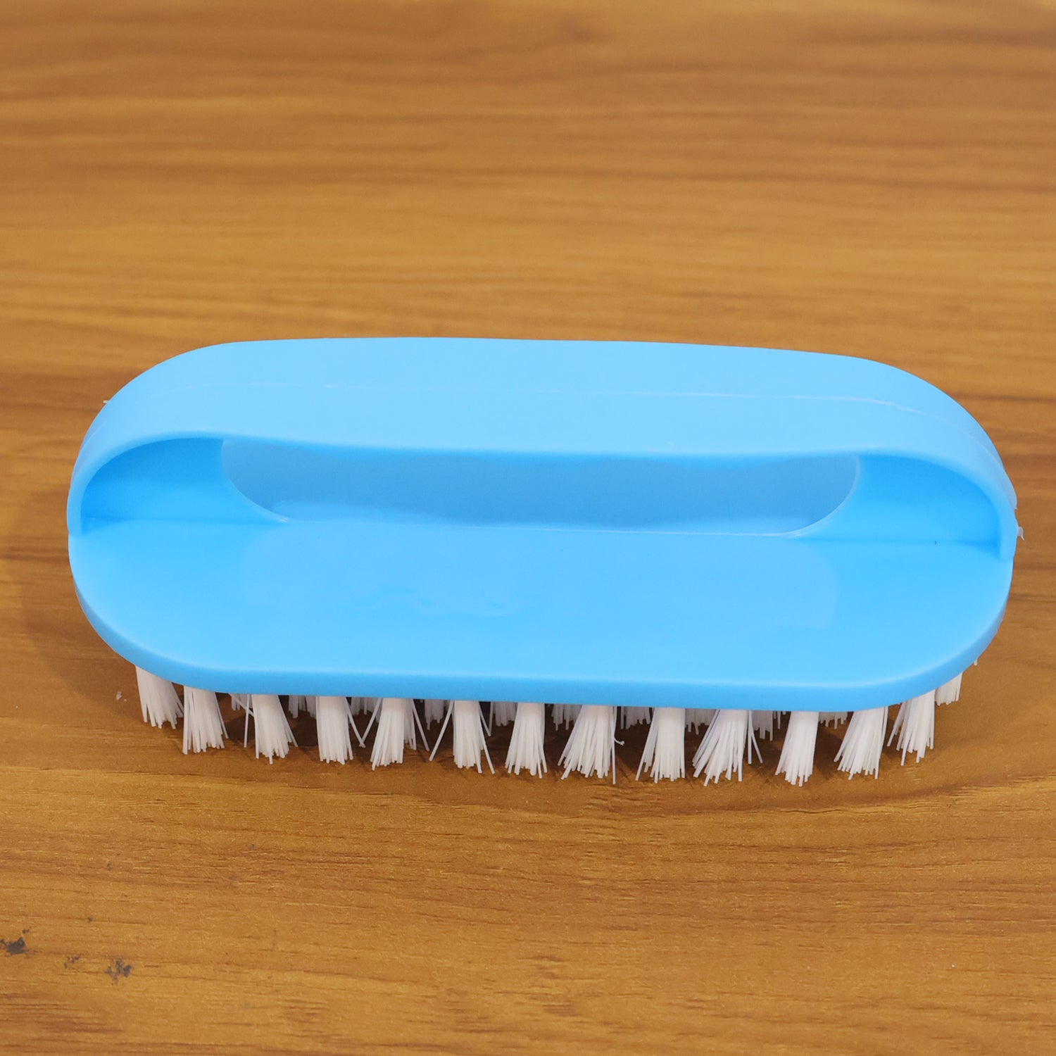 Heavy-duty scrub brush tool designed for deep cleaning stubborn dirt and stains.