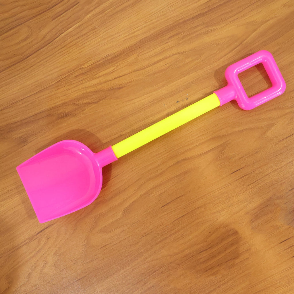 Set of colorful kids beach shovels and spades for sand play