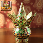 Ornate lotus crown kalash enhancing spiritual ambiance during rituals