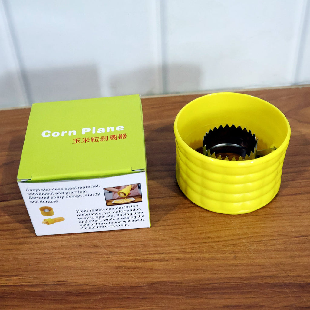 Corn peeler tool held by hand showing easy grip for removing kernels efficiently