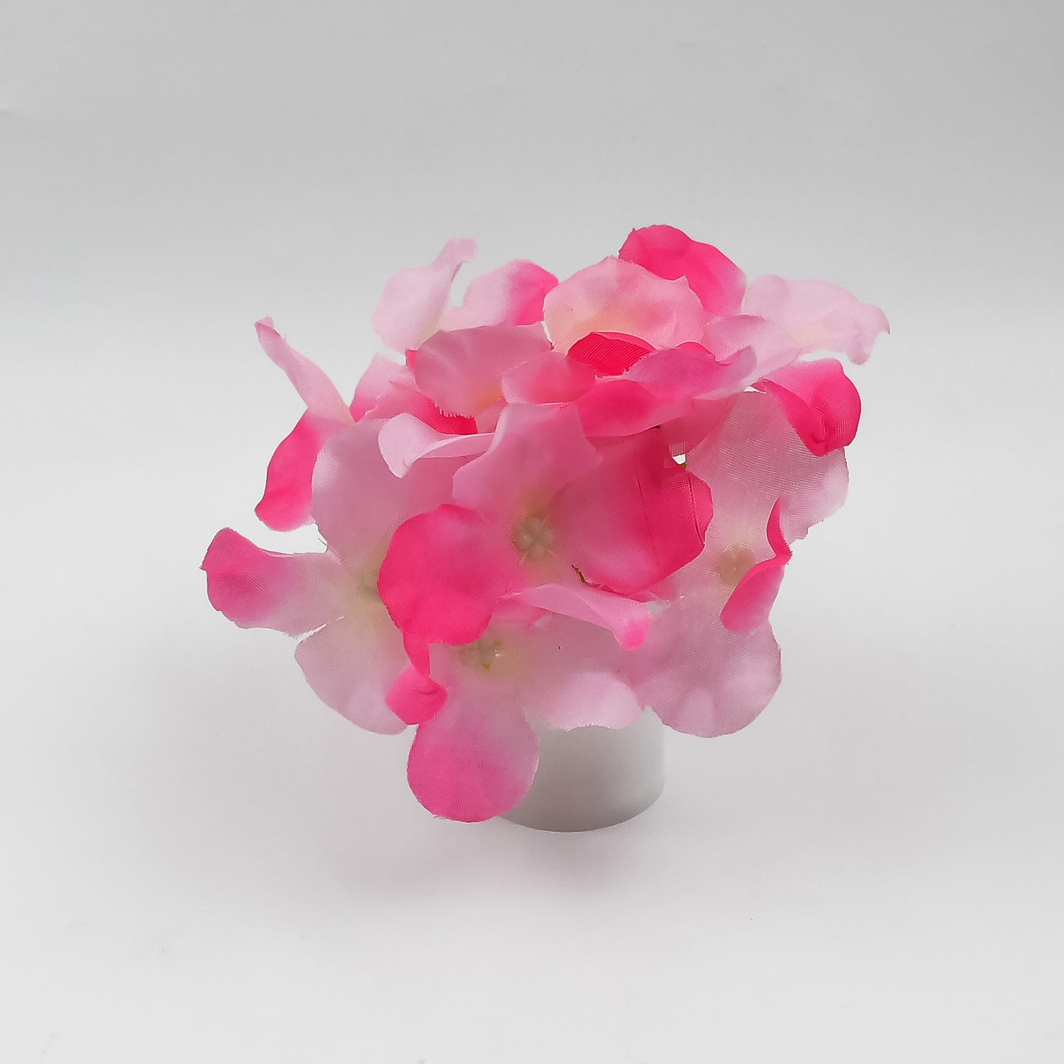 A vibrant LED flower light showcasing its intricate petals and soft glow.