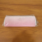 Organized makeup brushes and cosmetic tools in storage pouch