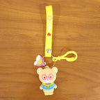 Playful cartoon teddy bear keychain featuring strong metal ring and silicone strap