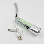 Portable mini flashlight held in hand, highlighting its compact size.
