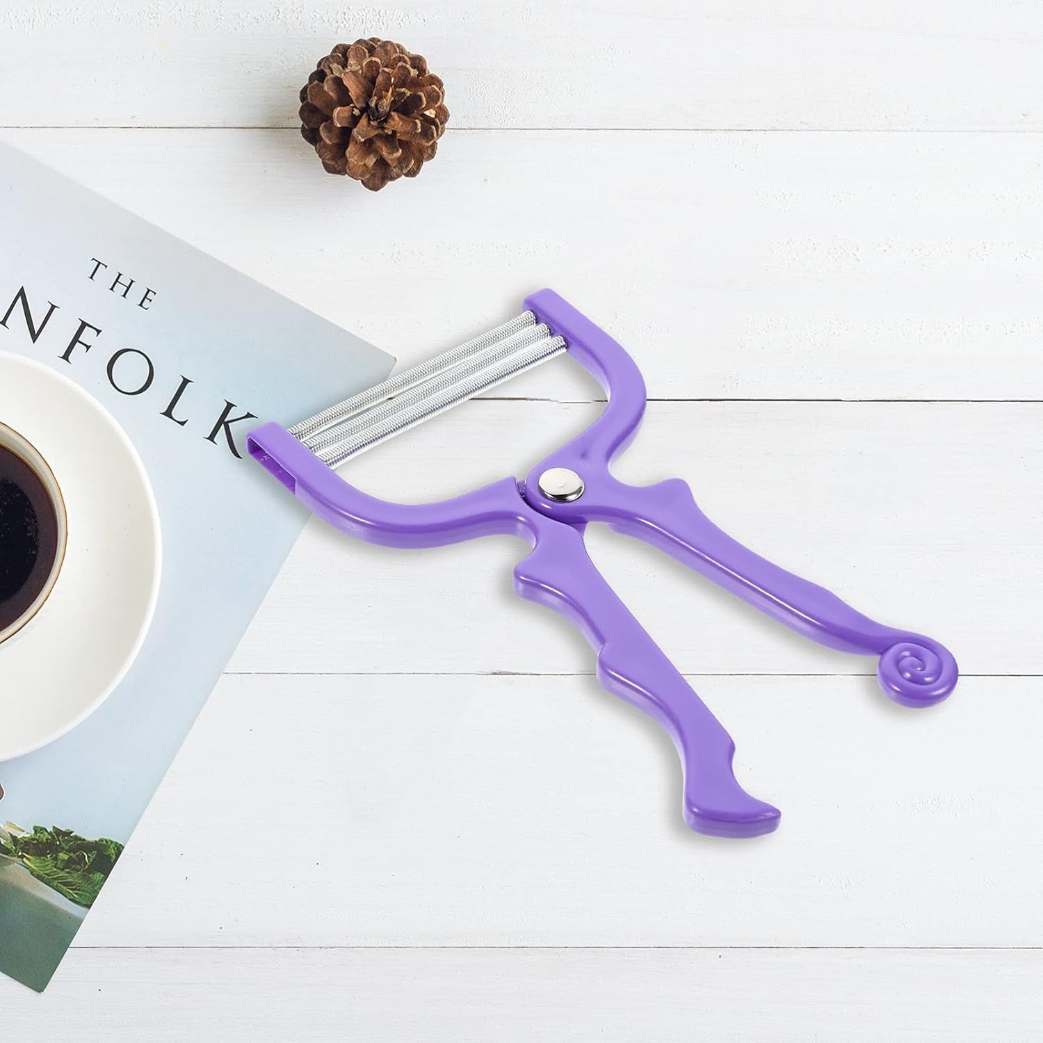 Facial hair remover threading tool in hand for easy hair removal