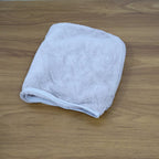Soft microfiber towel wrap drying hair without causing frizz or damage