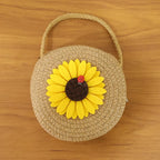 Strap and design detail of sunflower mini crossbody bag