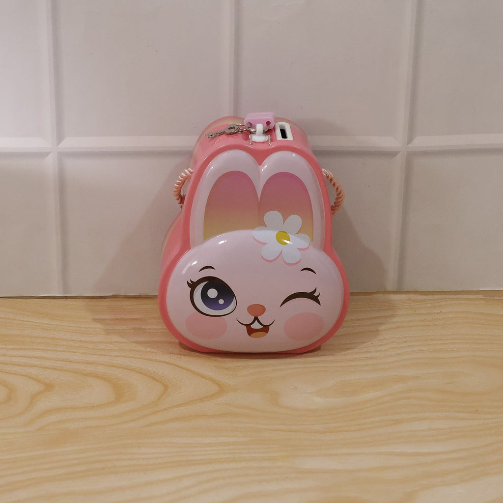 Playful pink bunny money box with lock and bright design