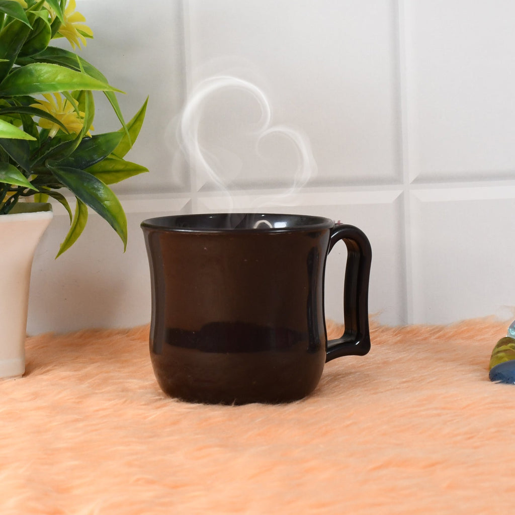 Close-up of a durable plastic coffee mug, highlighting its comfortable handle and sturdy design.