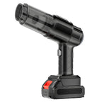 Cordless handheld vacuum with brush attachment for effective cleaning of upholstery and tight spaces.