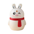 The red rabbit toothpick holder shown from a different angle, emphasizing its compact size.