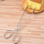 Long handle cooking tong for safe barbecue grilling.