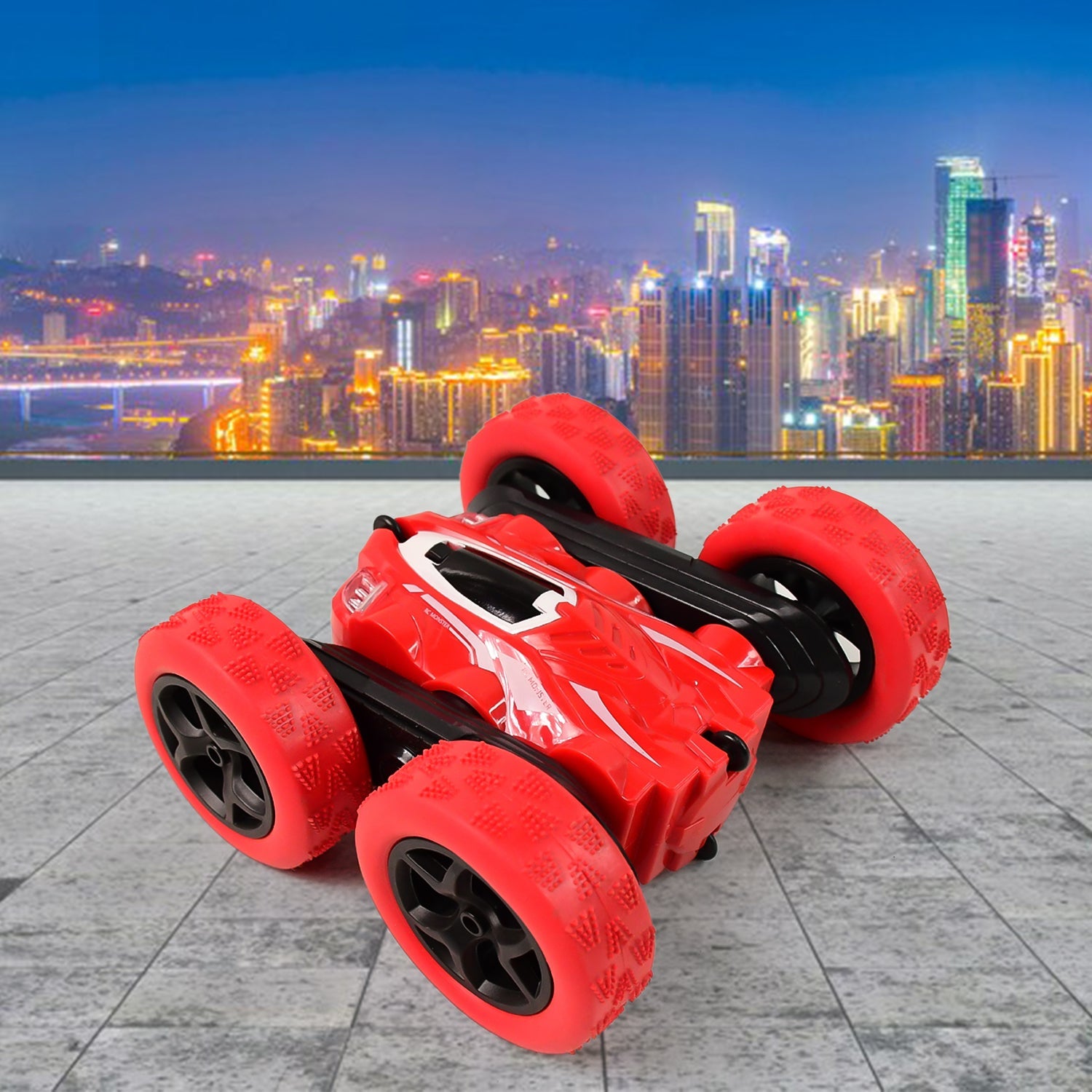 Closeup of Electroplay remote control stunt car front wheel and body