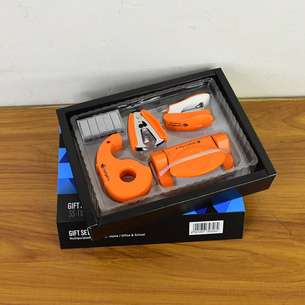Close-up of tape dispenser and staple remover in gift set