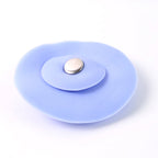 Flexible blue silicone sink stopper and strainer showing easy-to-clean design