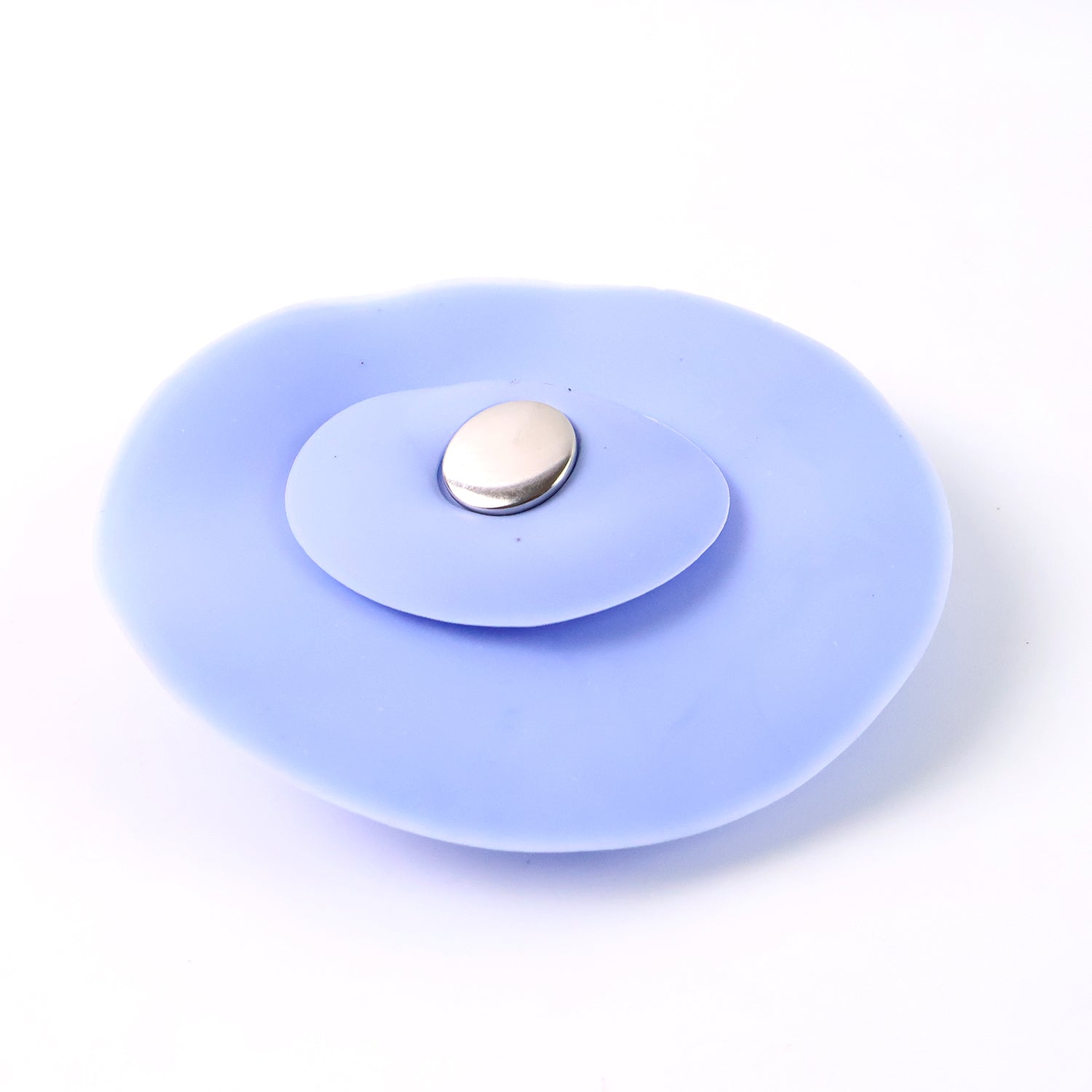 Flexible blue silicone sink stopper and strainer showing easy-to-clean design