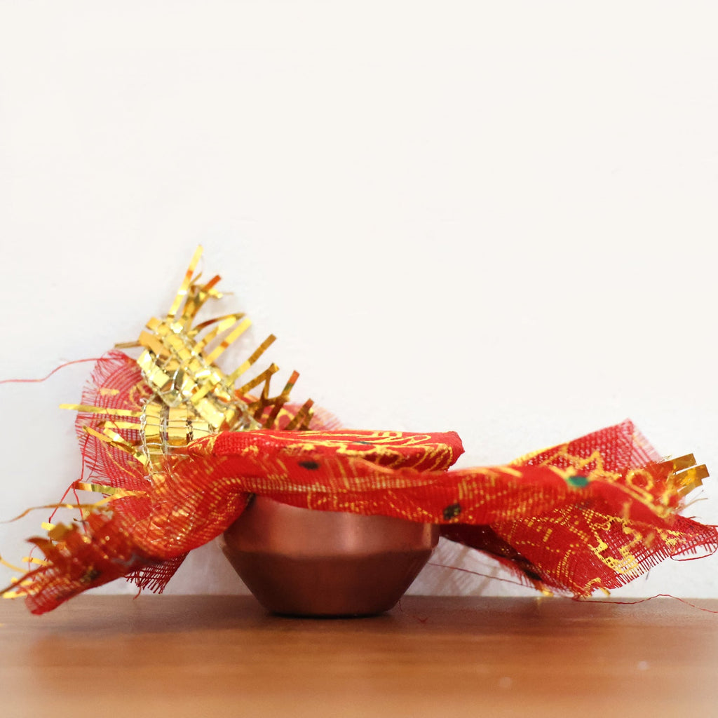 Mini kalash pooja set with navratna-style pieces and yantra tokens displayed