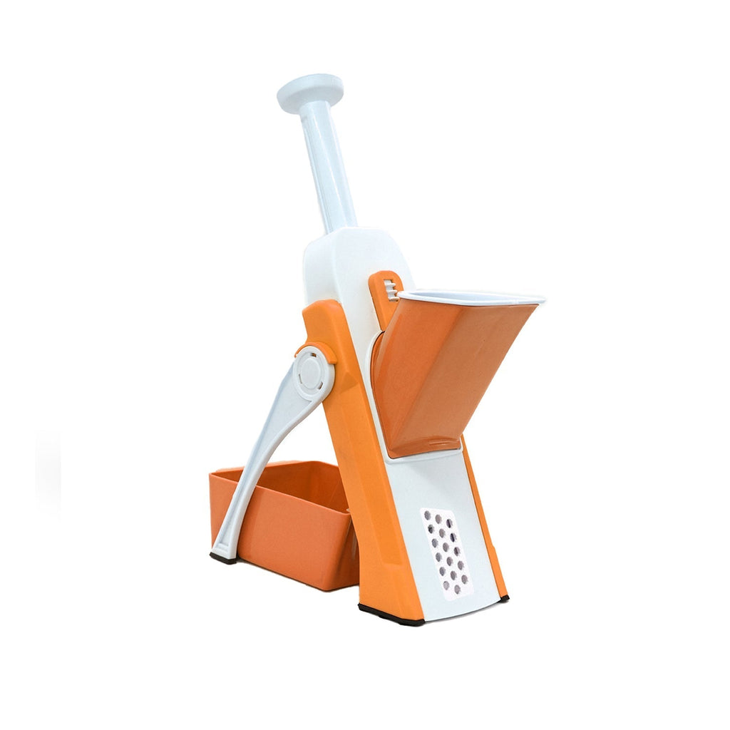 Fresh carrots being chopped effortlessly by the XcelCraft hand press.