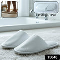 White hotel slippers designed for guest hygiene and comfort