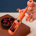 Ergonomic cherry pitter tool for effortless one-hand operation.