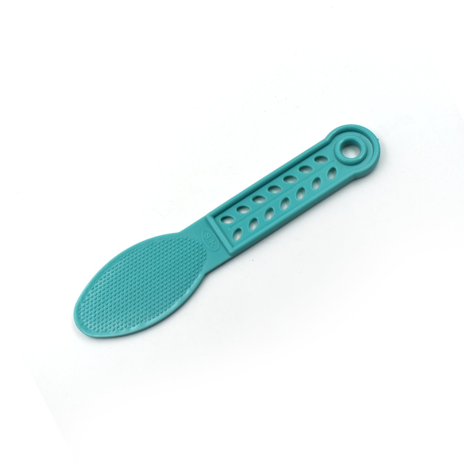 Hand holding the plastic foot scrubber, demonstrating its comfortable grip for pedicures.