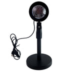 Sunset Projection Lamp demonstrating its 360-degree rotation capability.