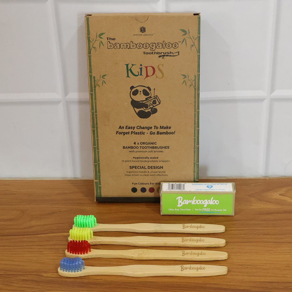 Side view of eco-friendly bamboo toothbrush with wooden handle