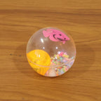 Light-up transparent sensory bouncy ball being used for fun