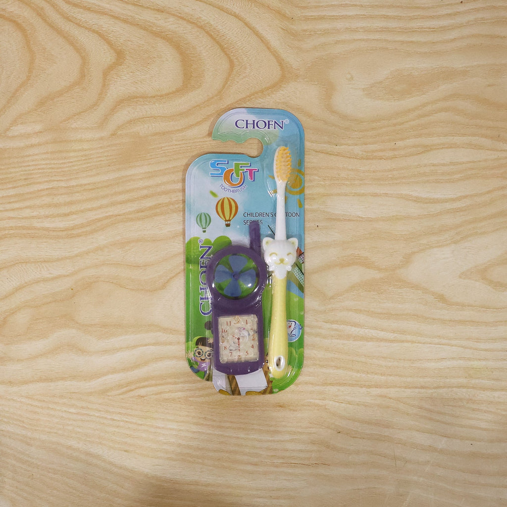 Overhead view of kids toothbrush set with fan toy