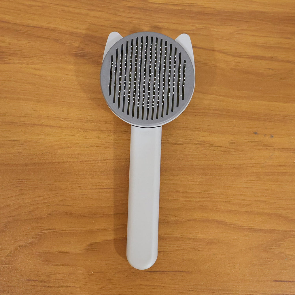 Reusable pet shedding needle comb suitable for dogs and cats