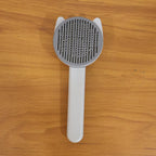 Reusable pet shedding needle comb suitable for dogs and cats