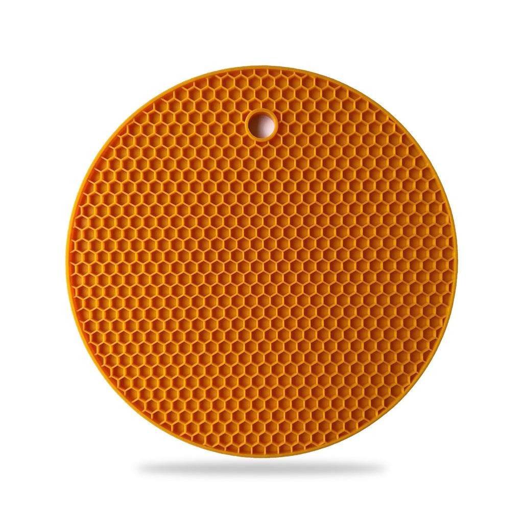 Flexible silicone trivet functioning as an outdoor drink cover.
