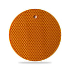 Flexible silicone trivet functioning as an outdoor drink cover.