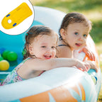 Group of children enjoying their inflatable surfboards at a sunny beach.