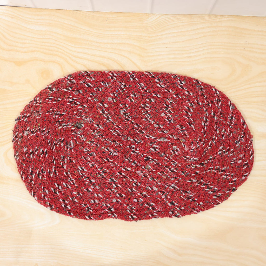 Detail shot of textured red floor mat for indoor use
