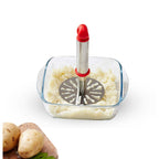 Side view of the Ganesh potato masher, highlighting its practical design.