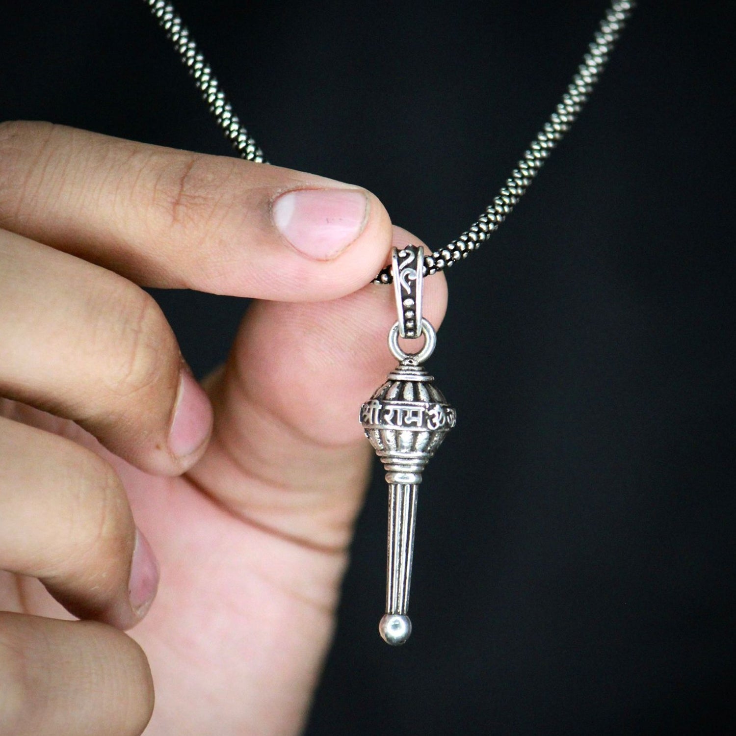 Detailed view of the Hanuman Gada Pendant, highlighting craftsmanship.