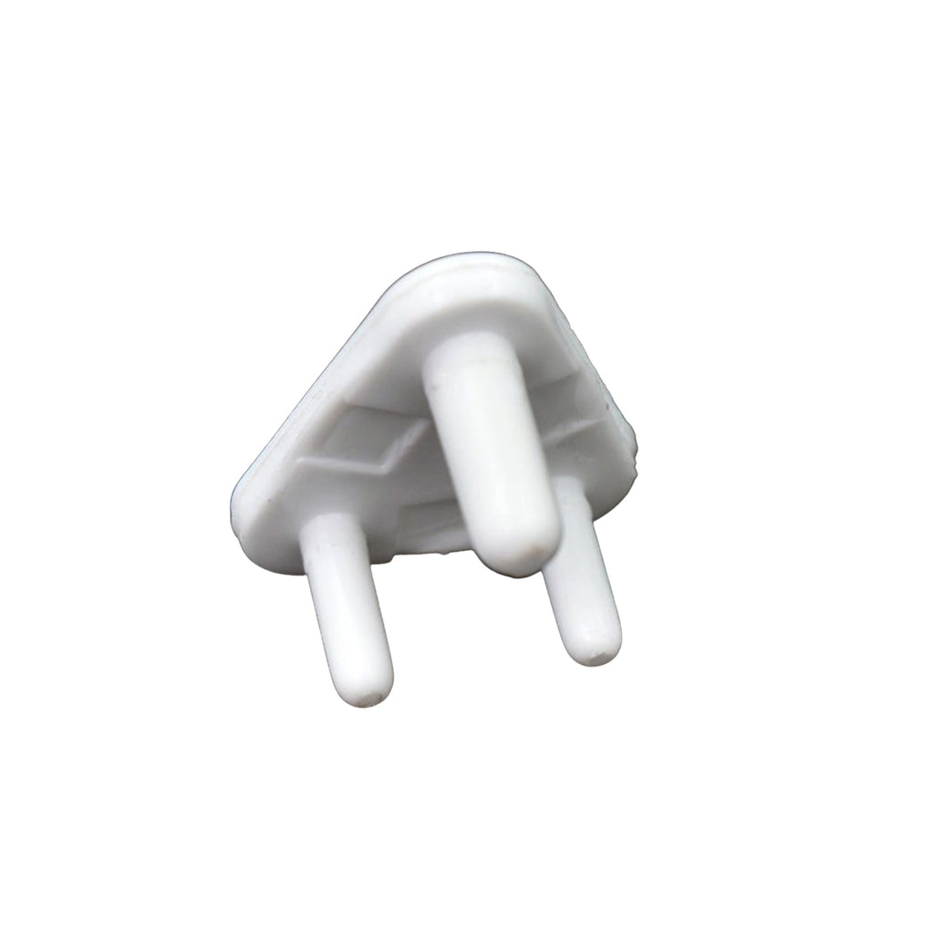 A child's hand reaching towards a covered electrical socket, demonstrating the protection of baby socket covers.