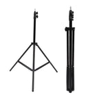 Portable DSLR camera tripod folded for easy transport, highlighting its lightweight design.