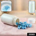 Freshening blue toilet tank cleaning tablet dissolving in water